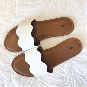 White scalloped sandals